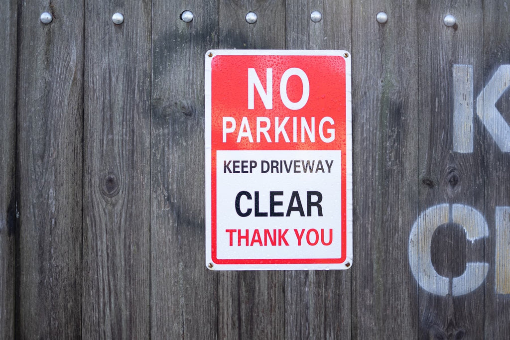 Is it legal to put up a No Parking sign outside my house? - The Sign Shed
