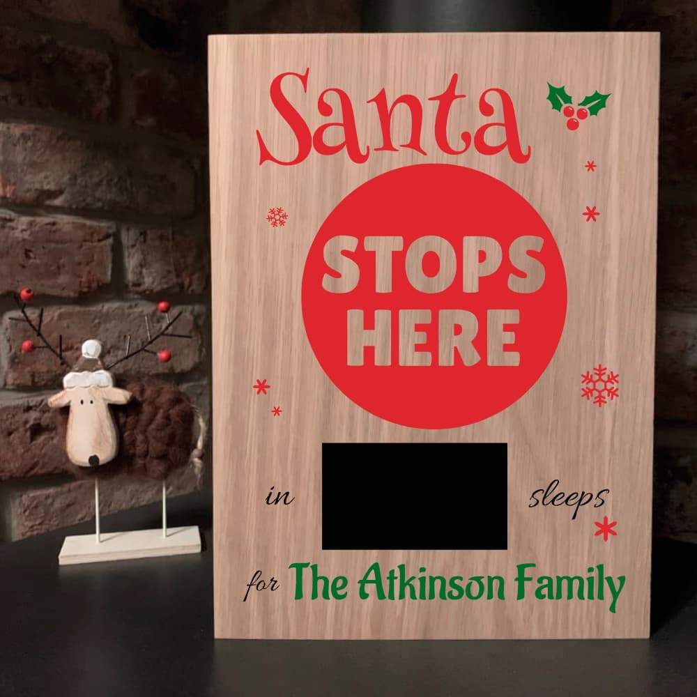 Personalised Santa Stops Here Sign - The Sign Shed