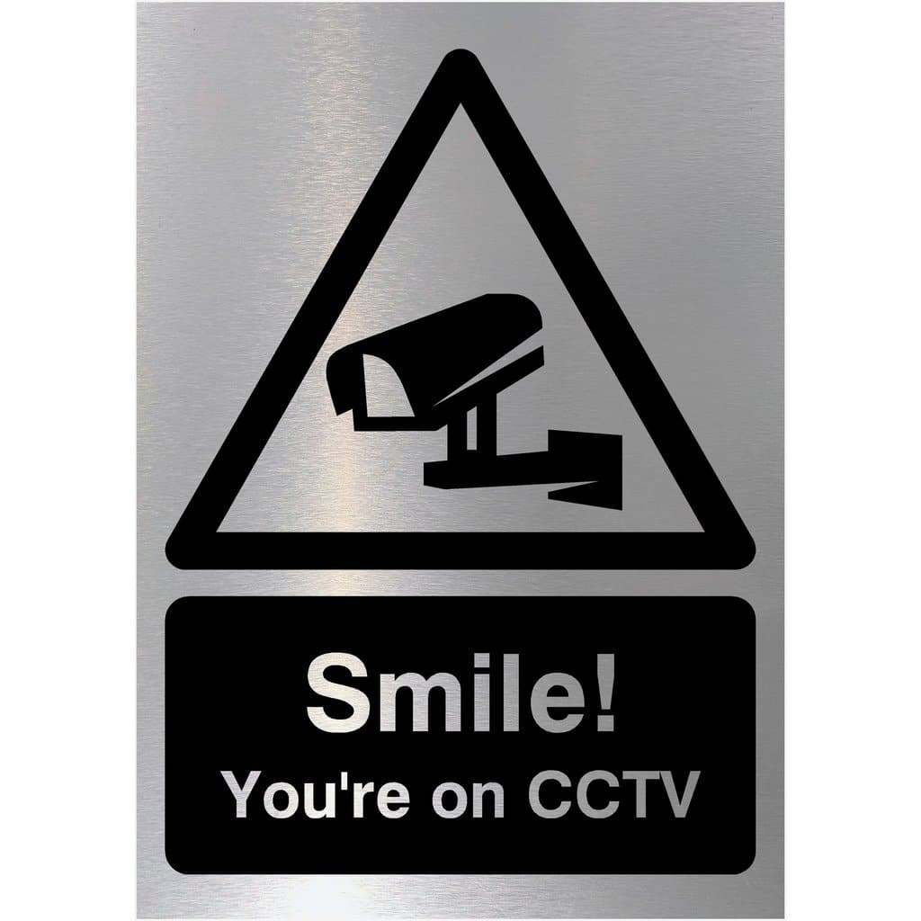 Smile You're On CCTV Sign in Brushed Silver - The Sign Shed
